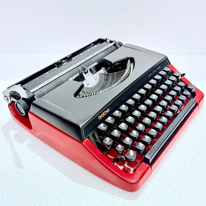 Brother Typewriter red black dual tone Japanese Typewriter, portable manual English typewriter store display