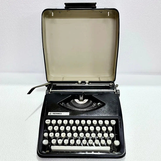 Hermes Baby Black Shadow manual English typewriter, portable typing machine, RR Typewriter Mart for collectors
