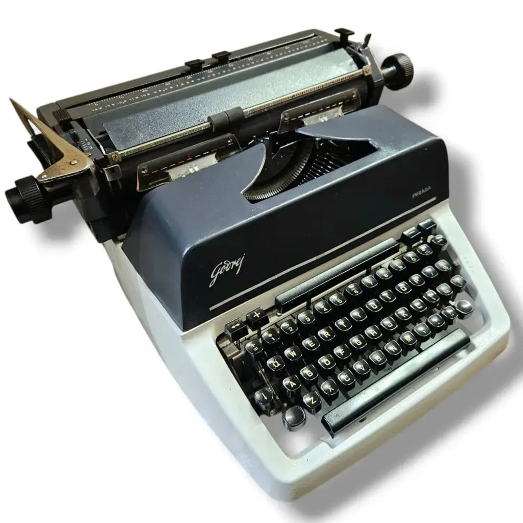 Angled view Godrej English Typewriter, manual English typing machine, available at RR Typewriter Mart store