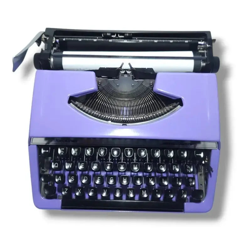Top view of Brother Charger 11 manual typewriter in vintage mauve color finish
