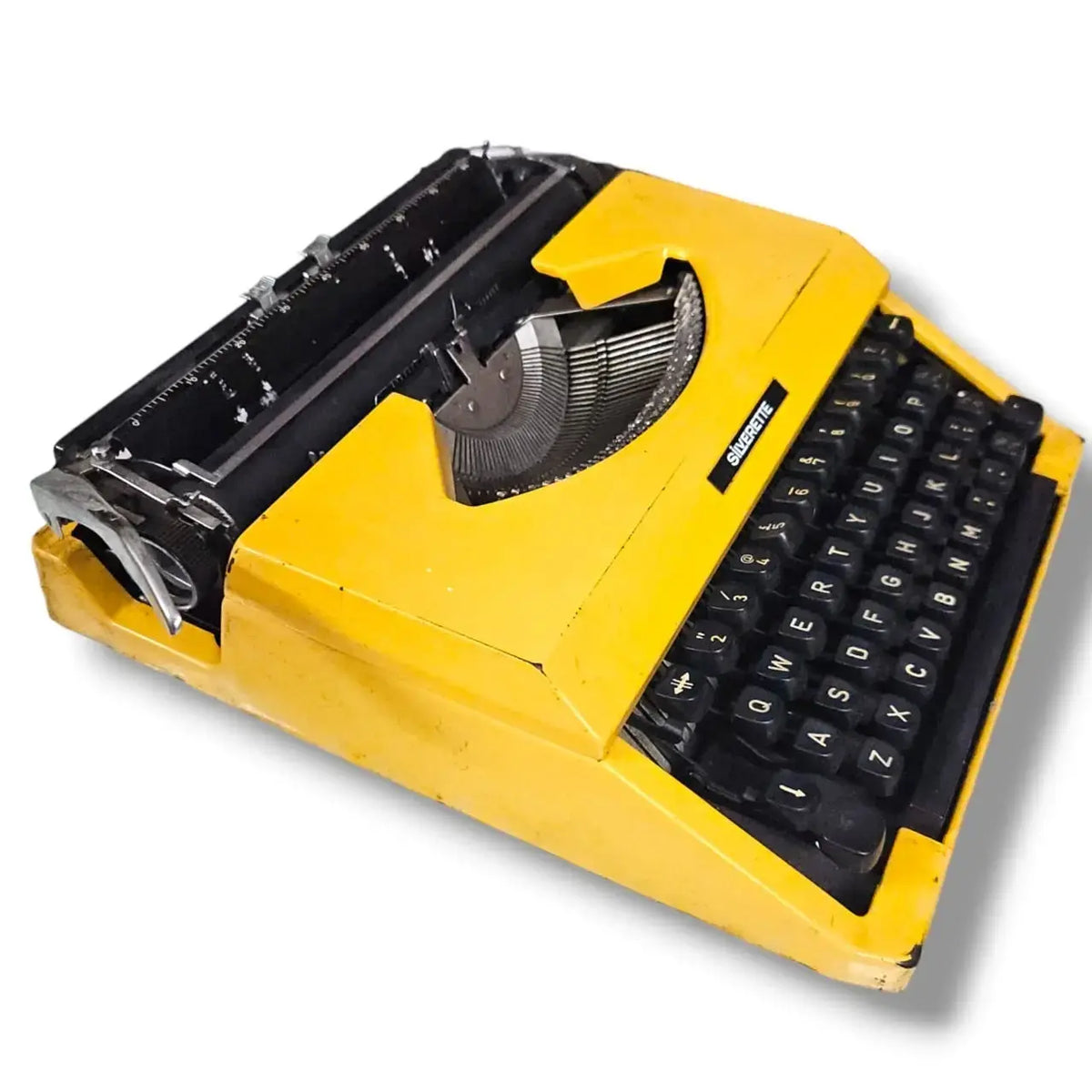 Angled Silver Reed Typewriter in yellow finish, imported typing machine from trusted typewriter store