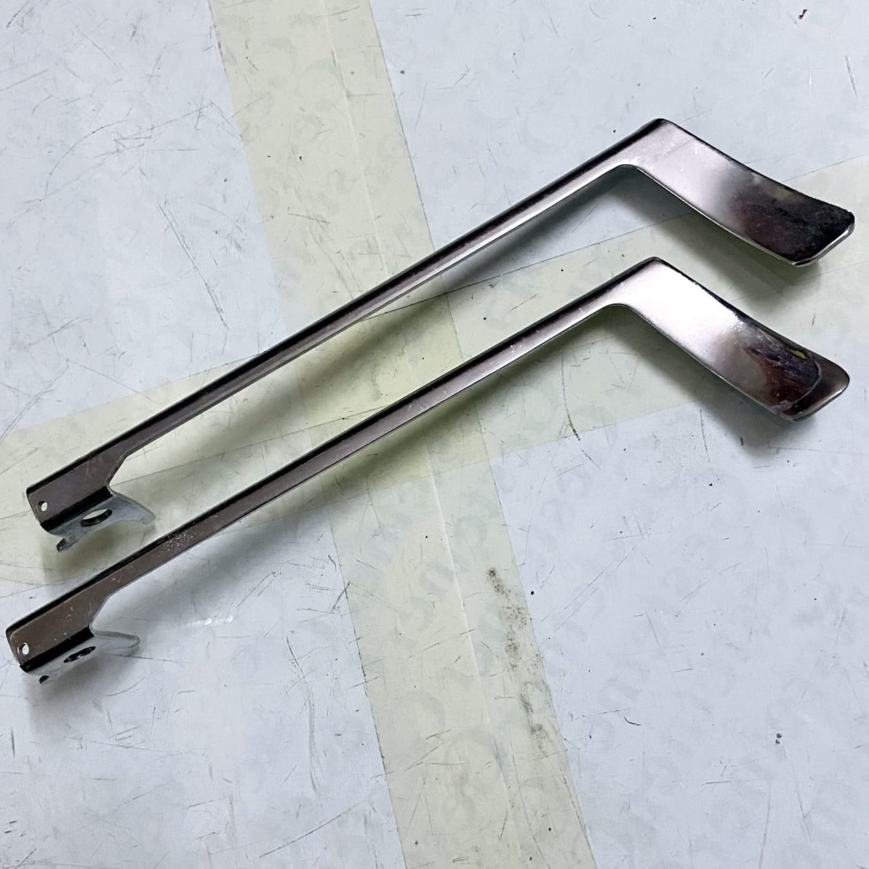 Close-up of the metal line space lever handle for a vintage Facit 1740 typewriter.