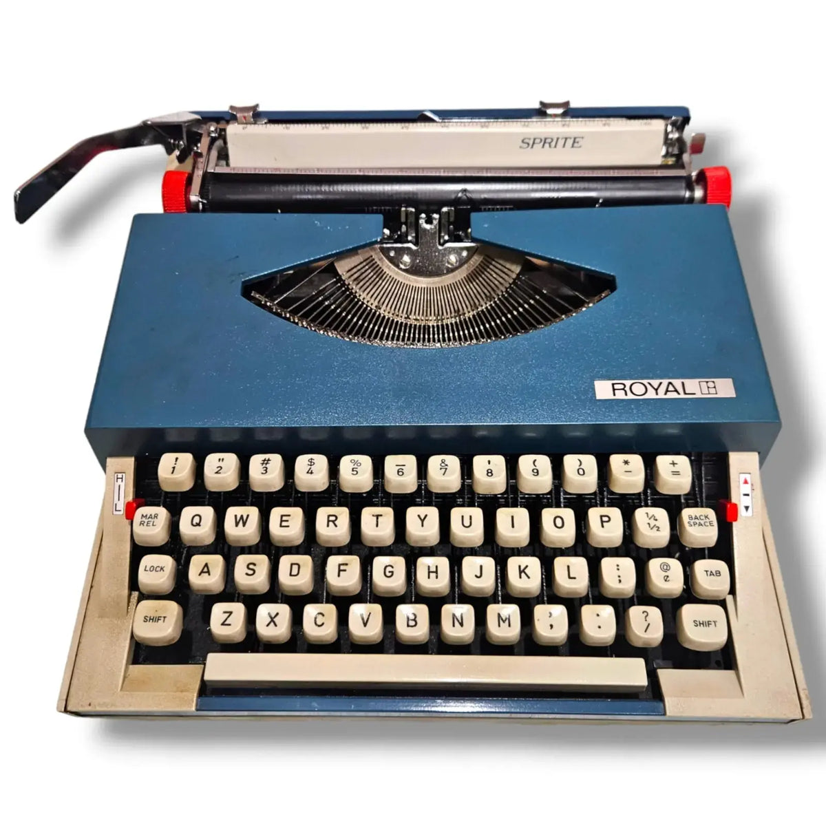 Vintage Royal Sprite portable typewriter angled front view with classic manual typing keyboard | RR Typewriter Mart