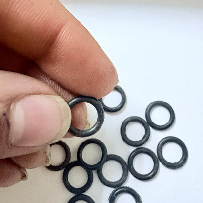 Close-up of Braille Typewriter rubber O-ring spare part used in feed roller mechanism by RR Typewriter Mart