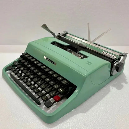 Olivetti Lettera 32 angled view, mint green manual English typewriter, buy typing machine from RR Typewriter Mart Delhi