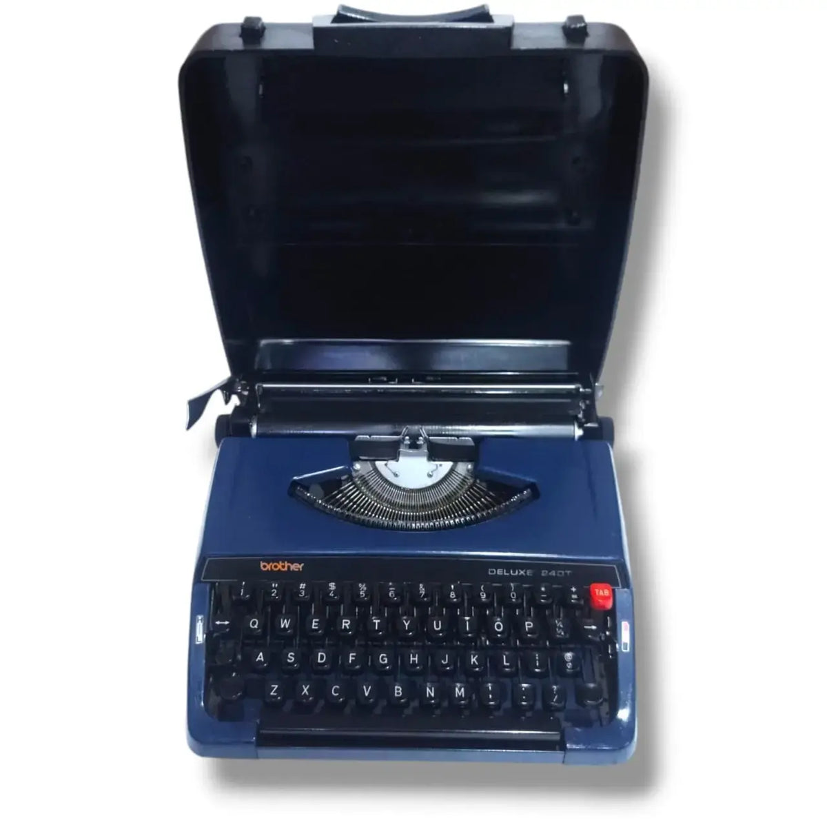 Brother Deluxe 240T portable typewriter with protective case open, vintage manual typing machine in blue