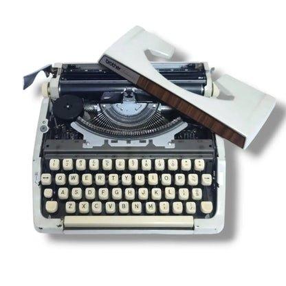 Brother Portable typing machine opened body manual English typewriter at RR Typewriter Mart