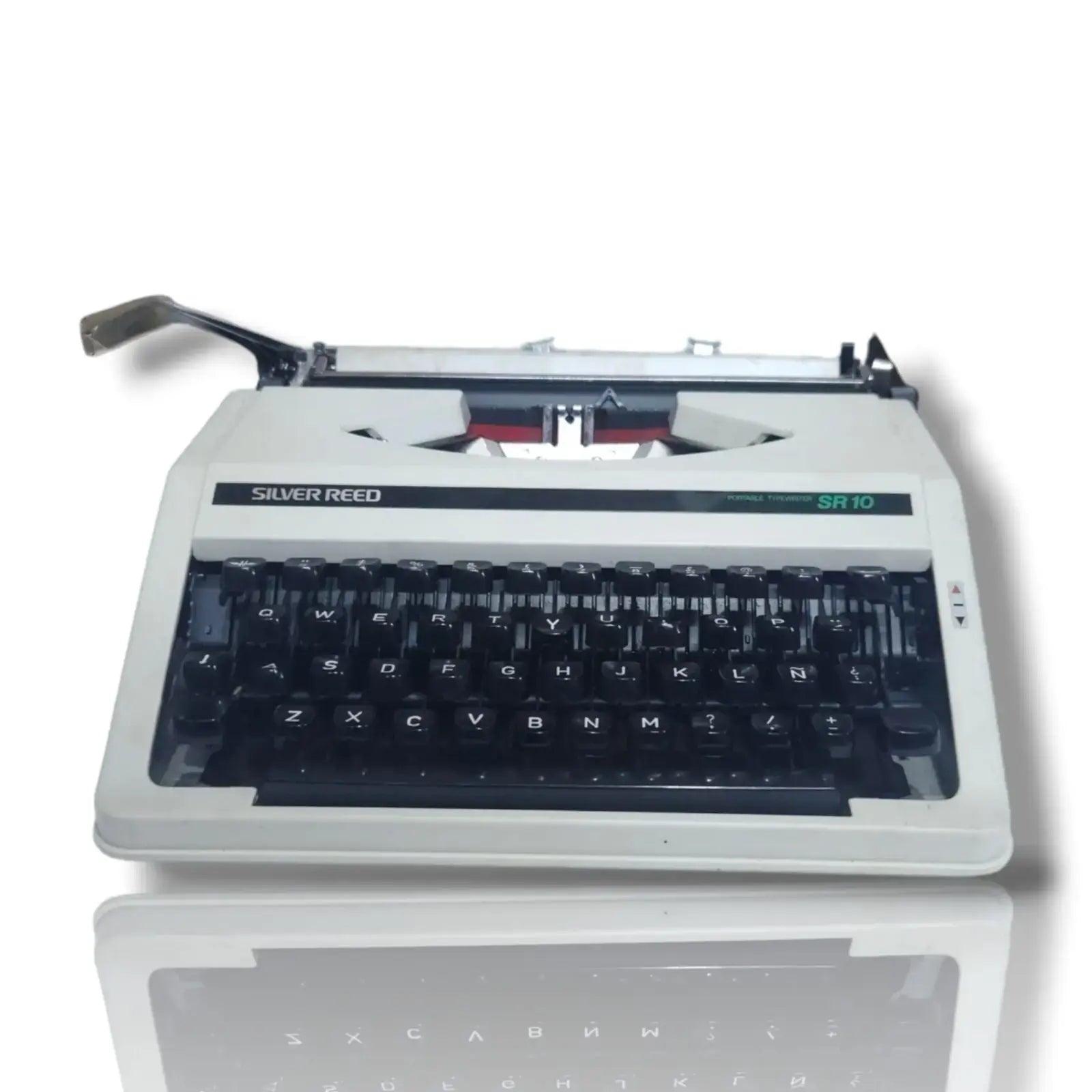 Buy Silver Reed portable typing machine with original case from trusted imported typewriter seller