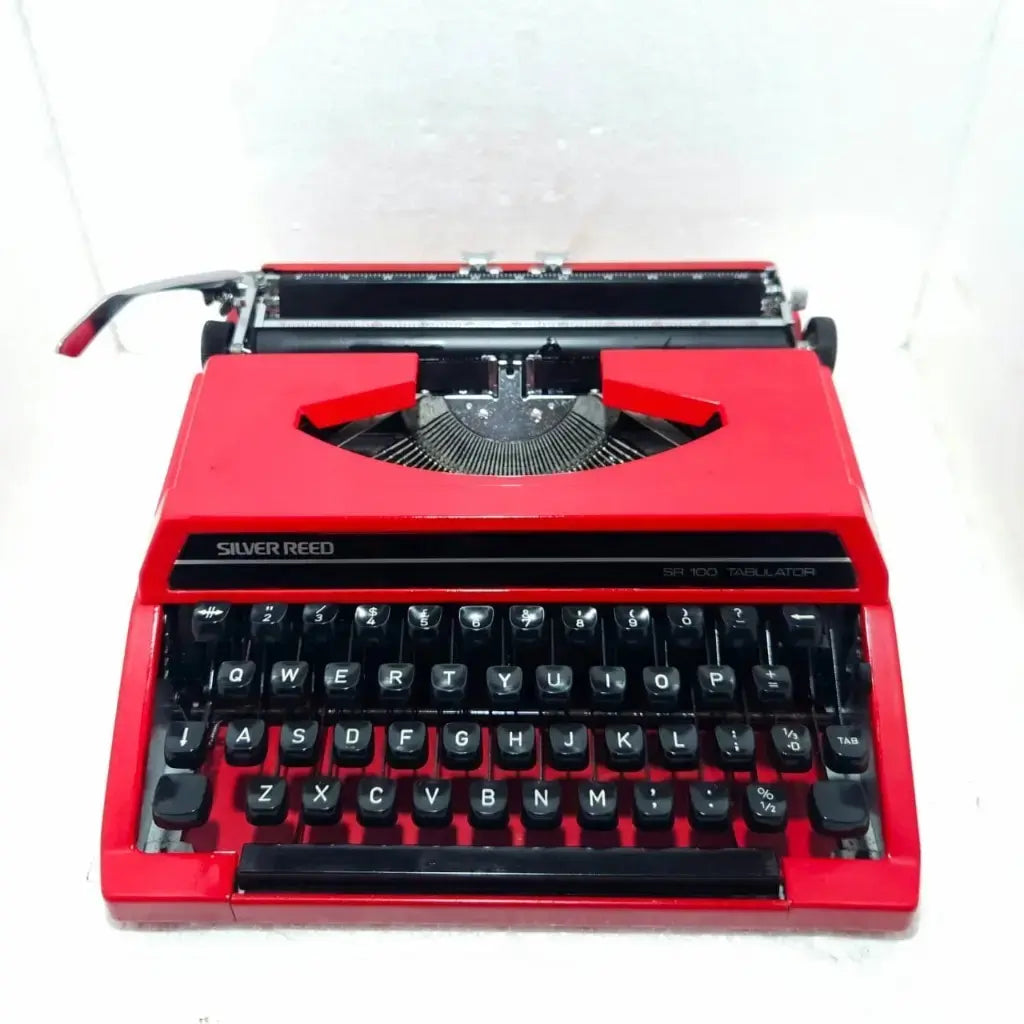 Silver Reed SR 100 Ruby Red Typewriter – Premium Portable English Typewriter, Home & Office Ready