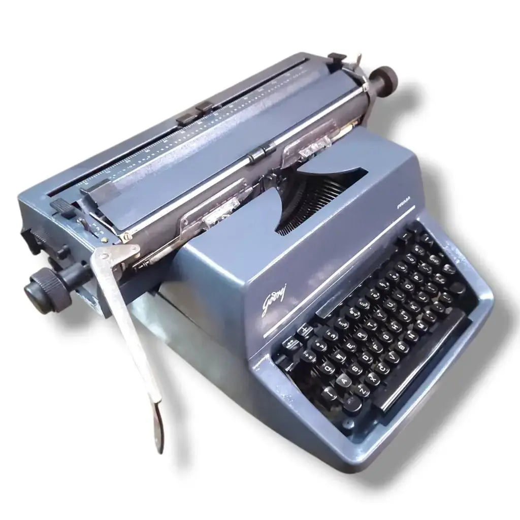 Angled view of Godrej English manual typewriter showing english key layout by RR Typewriter Mart