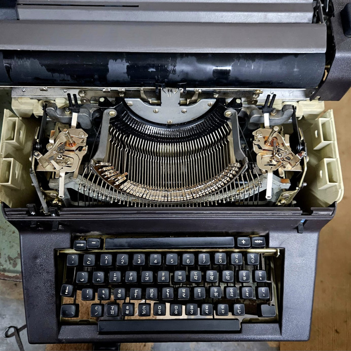 Facit 1740 Hindi typewriter with top cover open showing original typebars and internal mechanism