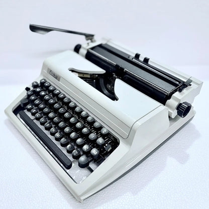 Angled view of Erika Typewriter showing keys, displayed by RR Typewriter Mart as a manual typewriter