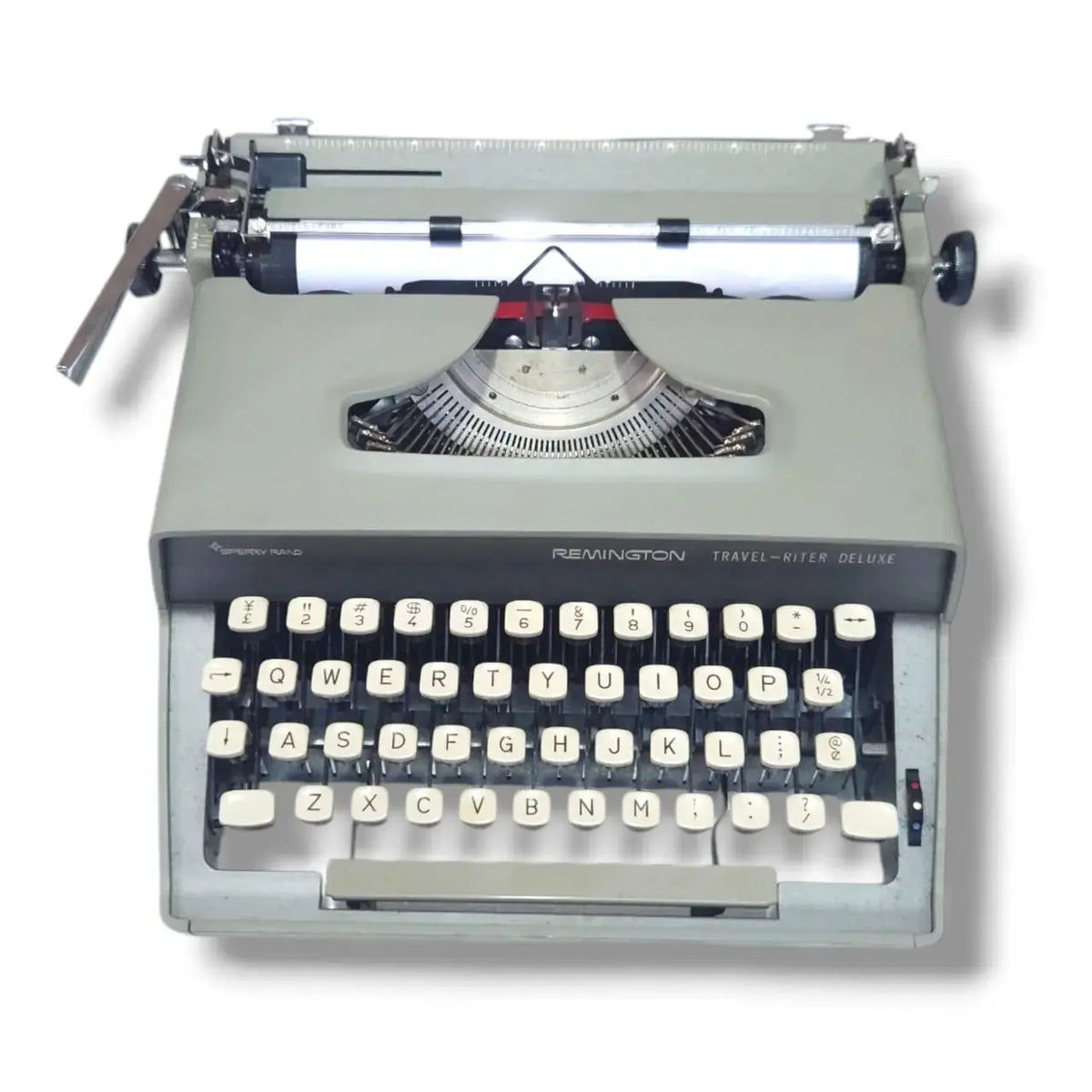 Remington Travel-Writer Deluxe portable typewriter, front view with English keyboard and classic two-tone body