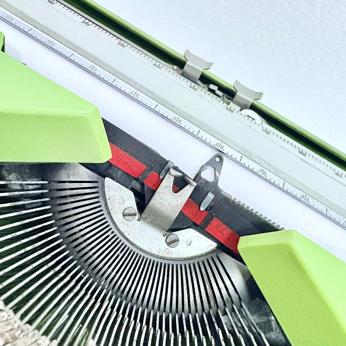 Vintage pistachio Hermes Baby typewriter with cursive script font for collectors from RR Typewriter Mart