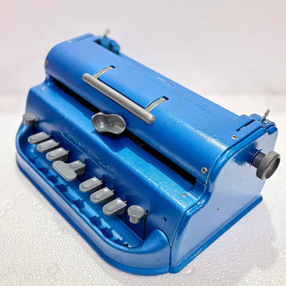 Angled view of Perkins Braille Typewriter, imported Braille typing machine from trusted Braille Typewriter Seller