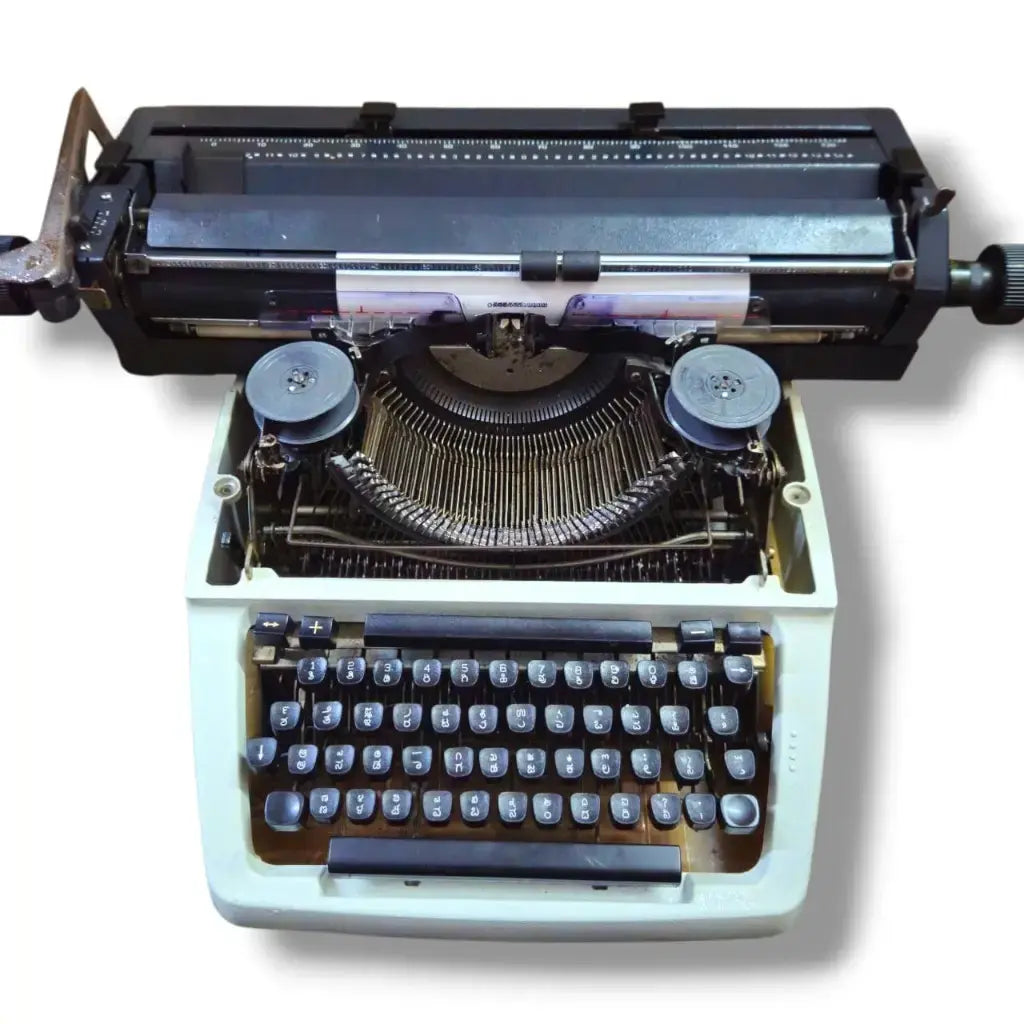 Open body Godrej Prima Kannada typing machine showing internal metal mechanism