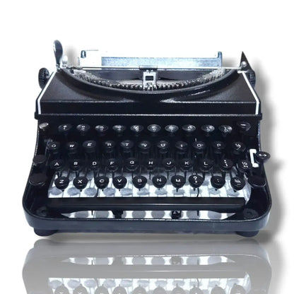 Front view of Remington 5 Portable Typewriter with classic keyboard and metal body
