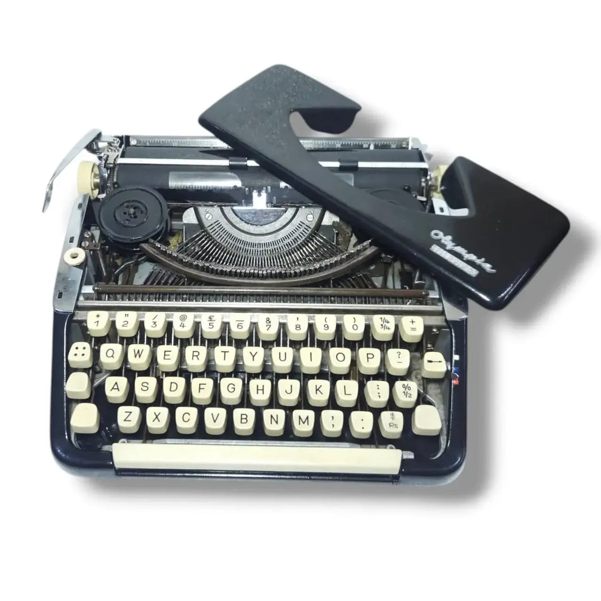 Open body Olympia typewriter with ribbon spool, portable typing machine at trusted typewriter store