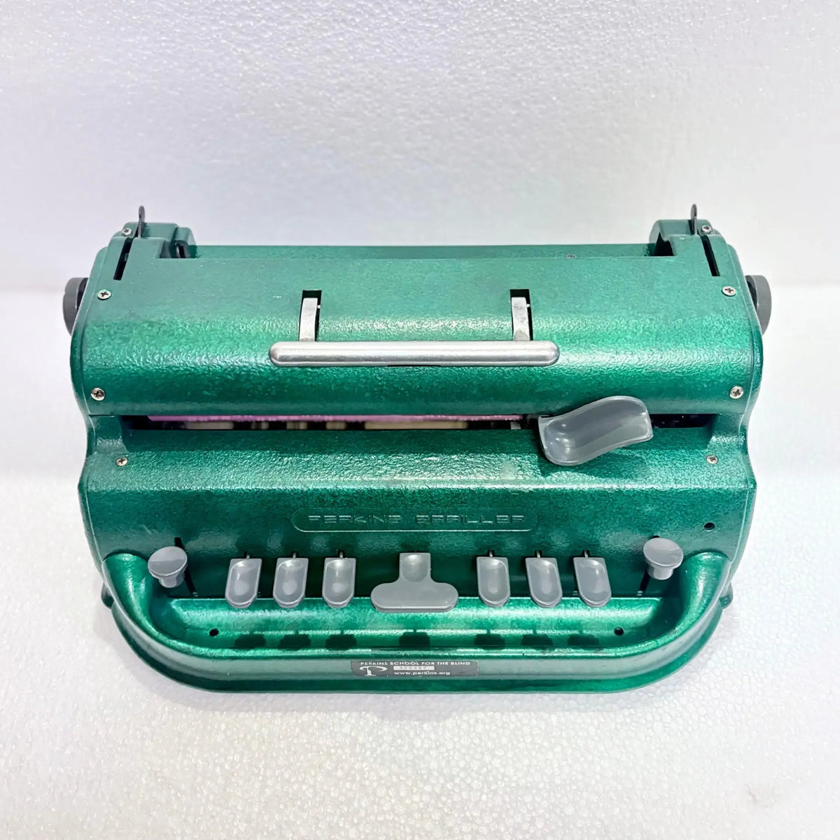 Top view of Perkins Braille Typewriter in Emerald Green, Braille typing machine from trusted Braille Seller
