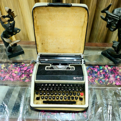 Olivetti portable typewriter displayed inside original carry case, English keyboard, restored by RR Typewriter Mart