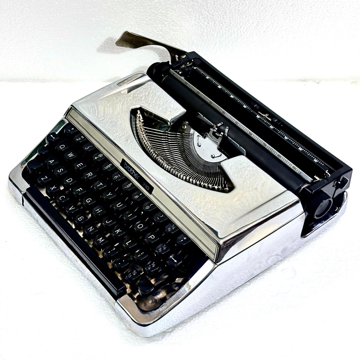 Buy Brother 210 mirror chrome manual typewriter for collectors and writers from RR Typewriter Mart India