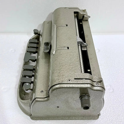 American Braille Typewriter with six primary keys, a space bar and manual embossing action for Braille paper from RR Typewriter Mart