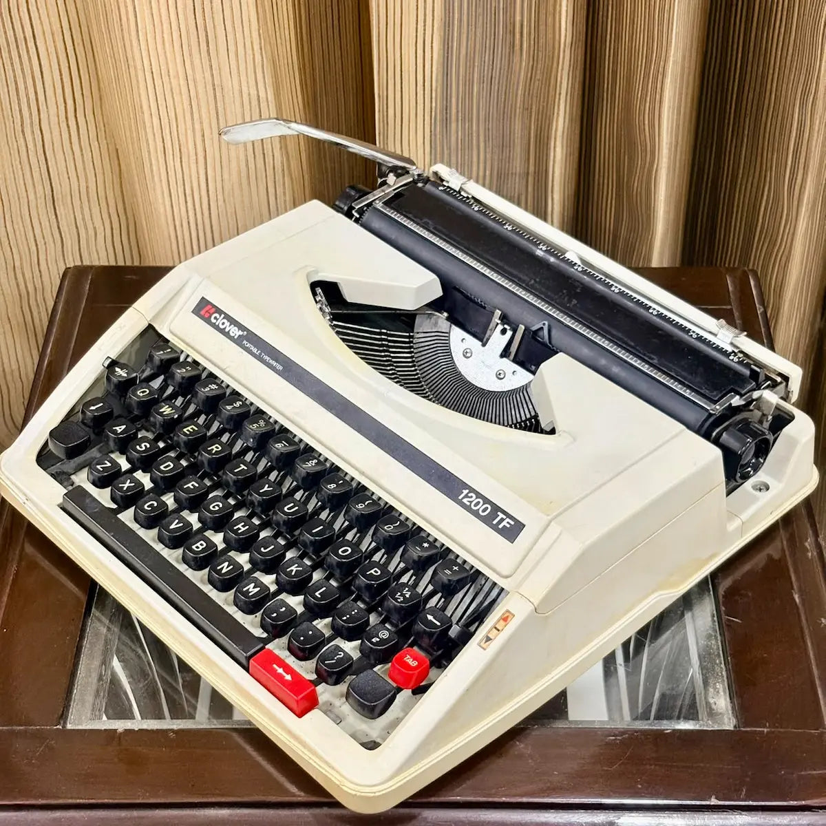 Clover 1200 TF vintage typewriter front profile, compact cream portable manual typing machine for writers