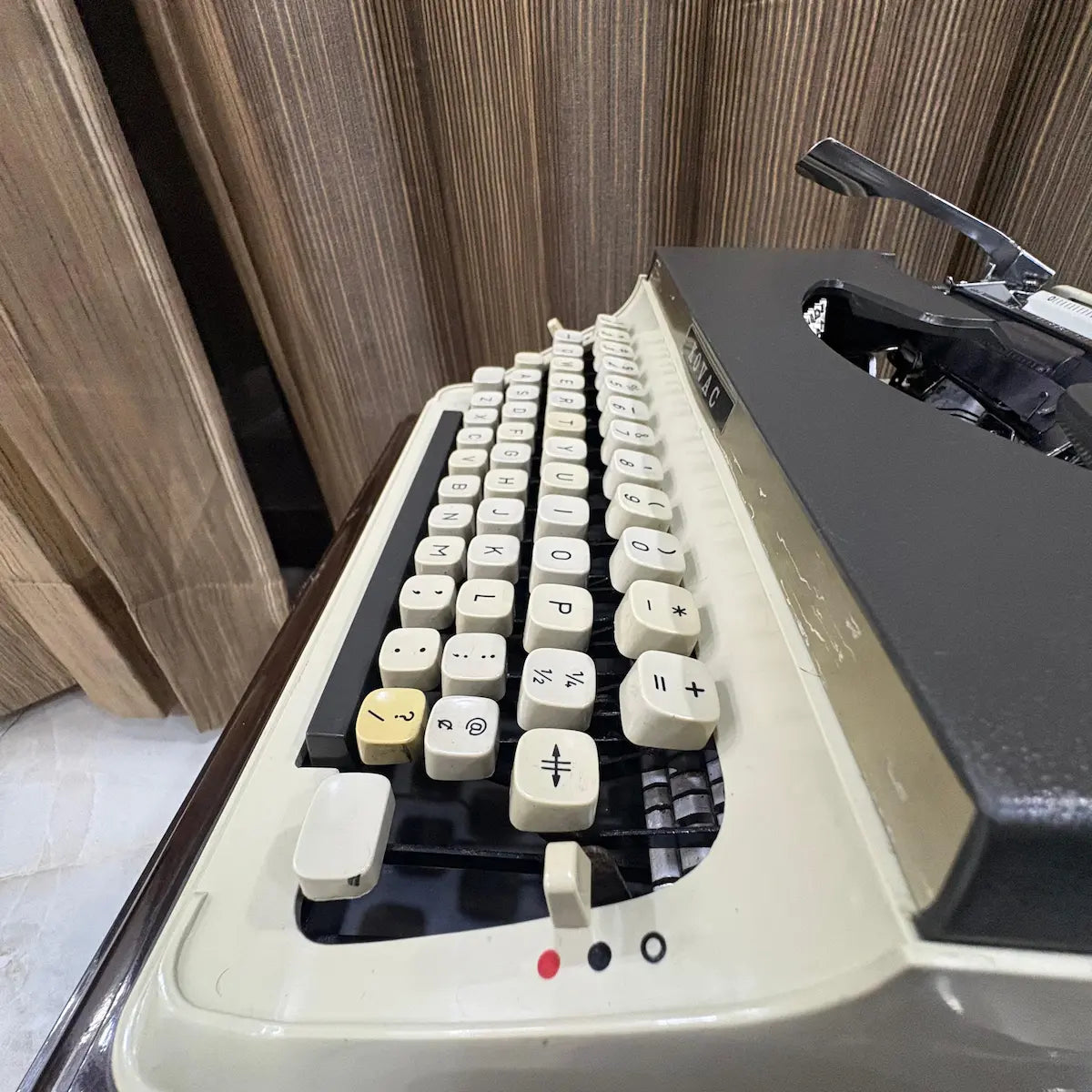 Shop Kovac M-101A Japanese portable typewriter, featuring a classic cream keyboard, original grey panel and ivory body | RR Typewriter Mart