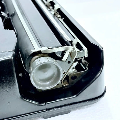 Black Hermes Baby Black Shadow typewriter, vintage portable typing machine, RR Typewriter Mart typing enthusiasts