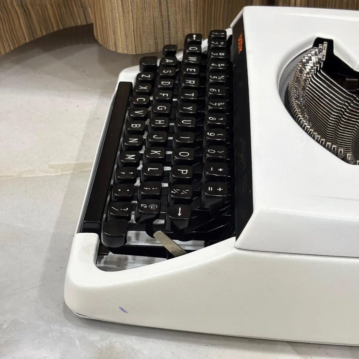 Pearl White Brother Deluxe 220 vintage typewriter, portable mechanical QWERTY typewriter available from RR Typewriter Mart India