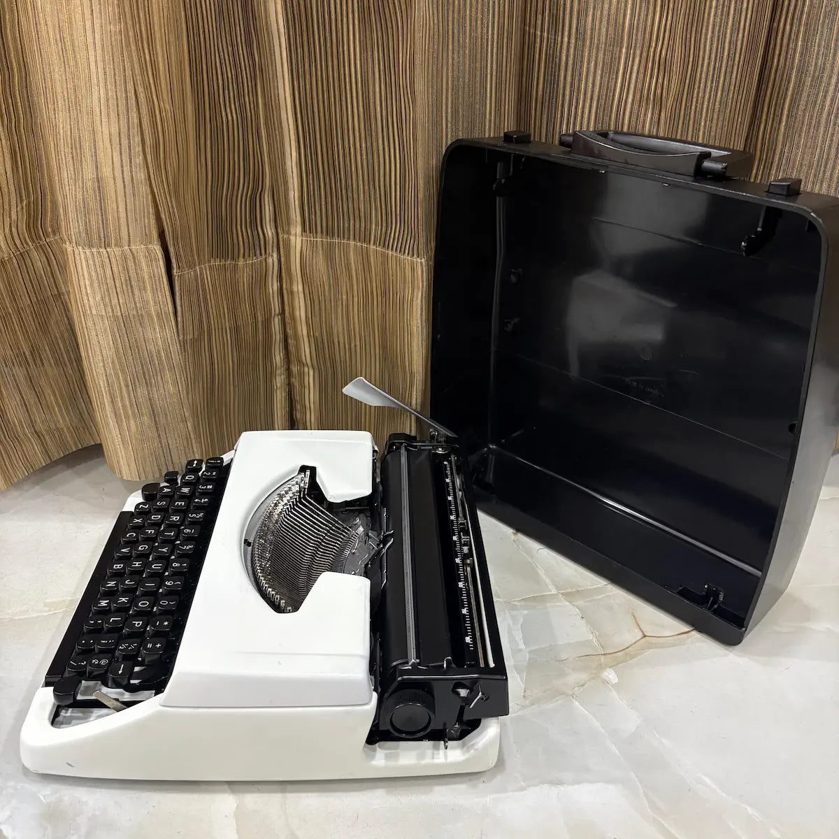 Pearl White Brother Deluxe 220 typewriter, vintage portable QWERTY typewriter with mechanical action from RR Typewriter Mart India