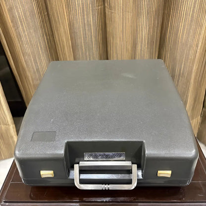 Japanese Kovac M-101A manual English typewriter with cream keys, charcoal grey panel and elegant ivory body | RR Typewriter Mart