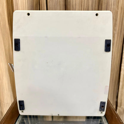 Royal Junior semi portable typewriter underside showing cream base and rubber feet, from RR Typewriter Mart.