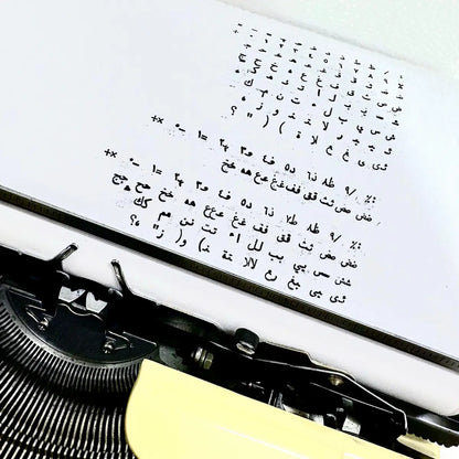 Brother Deluxe 750TR Arabic typewriter front view with cream finish, Arabic keys and classic mechanical typing mechanism, ready to use