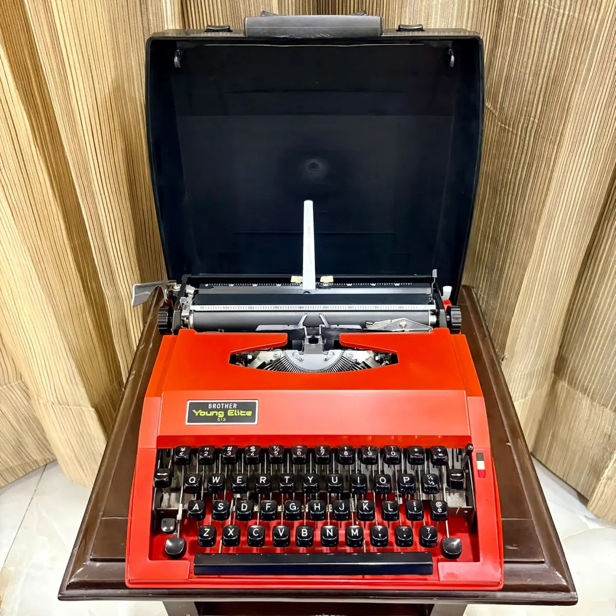 Brother Young Elite 513 scarlet red portable typewriter in open carrying case, vintage manual English typing machine | RR Typewriter Mart
