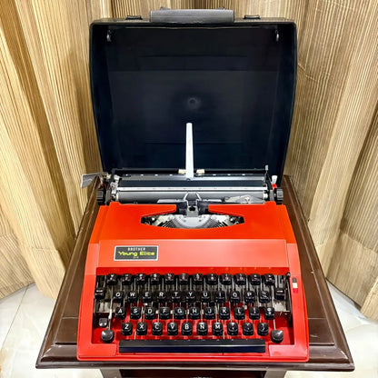 Brother Young Elite 513 scarlet red portable typewriter in open carrying case, vintage manual English typing machine | RR Typewriter Mart