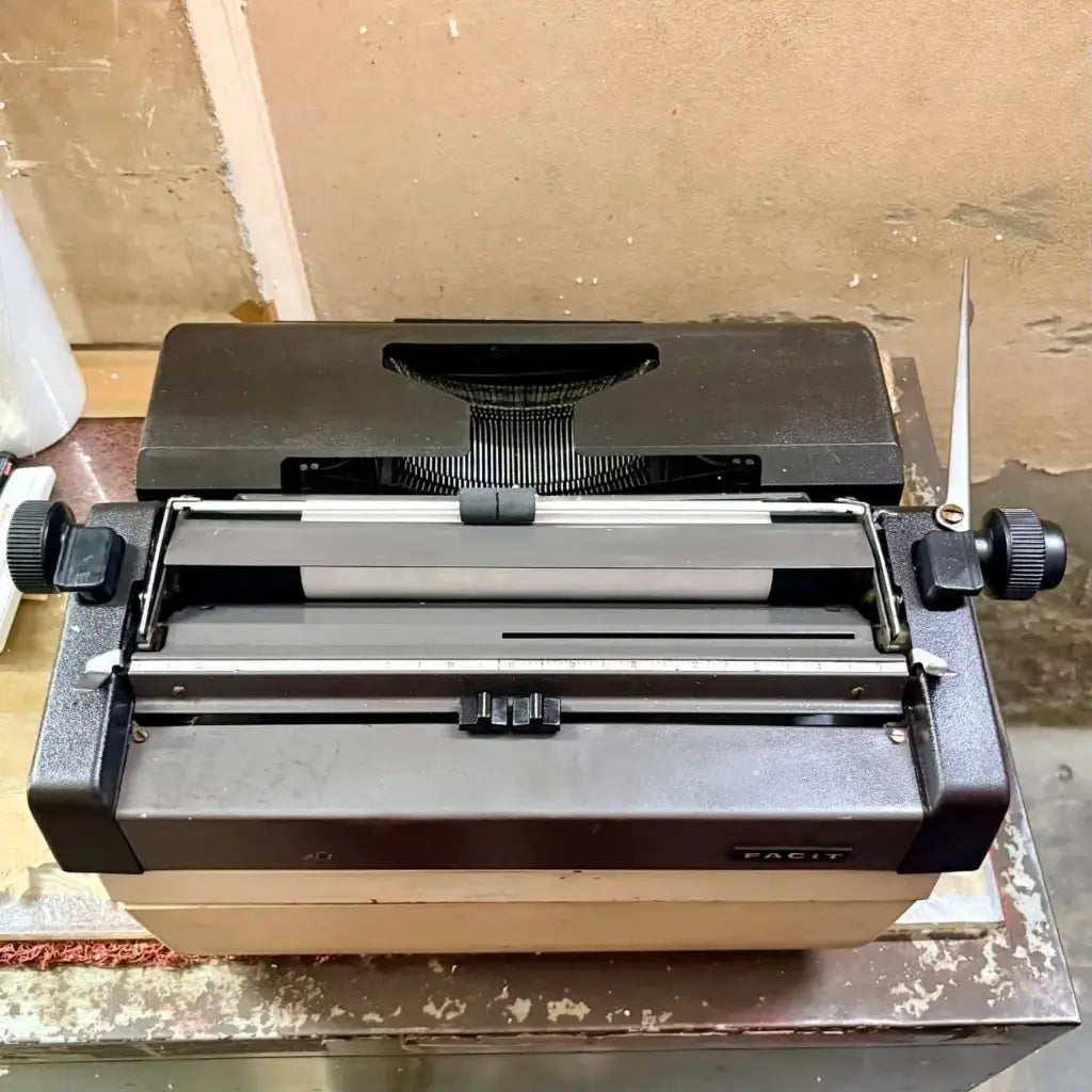 Rear view of Facit Typewriter with paper, platen and carriage visible, Hindi Typing Machine from RR Typewriter Mart