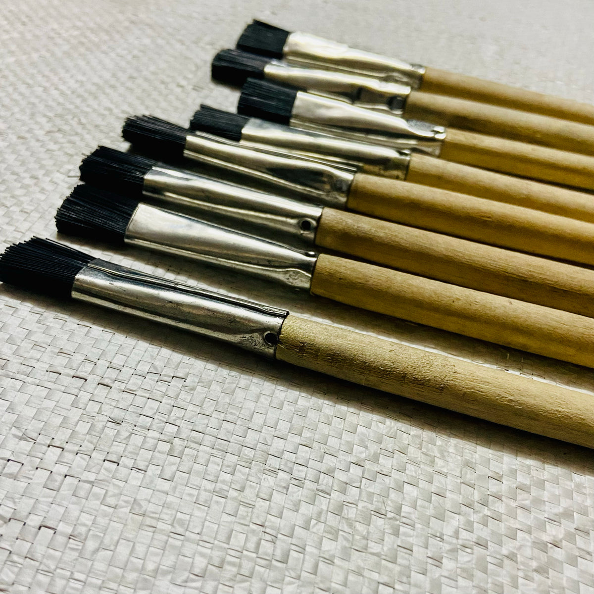Close view of brush for typing machine with black nylon bristles, Typewriter parts shop and care parts