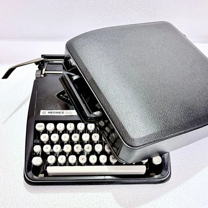 Hermes Baby Black Shadow portable typewriter, vintage manual typing machine, RR Typewriter Mart for collectors