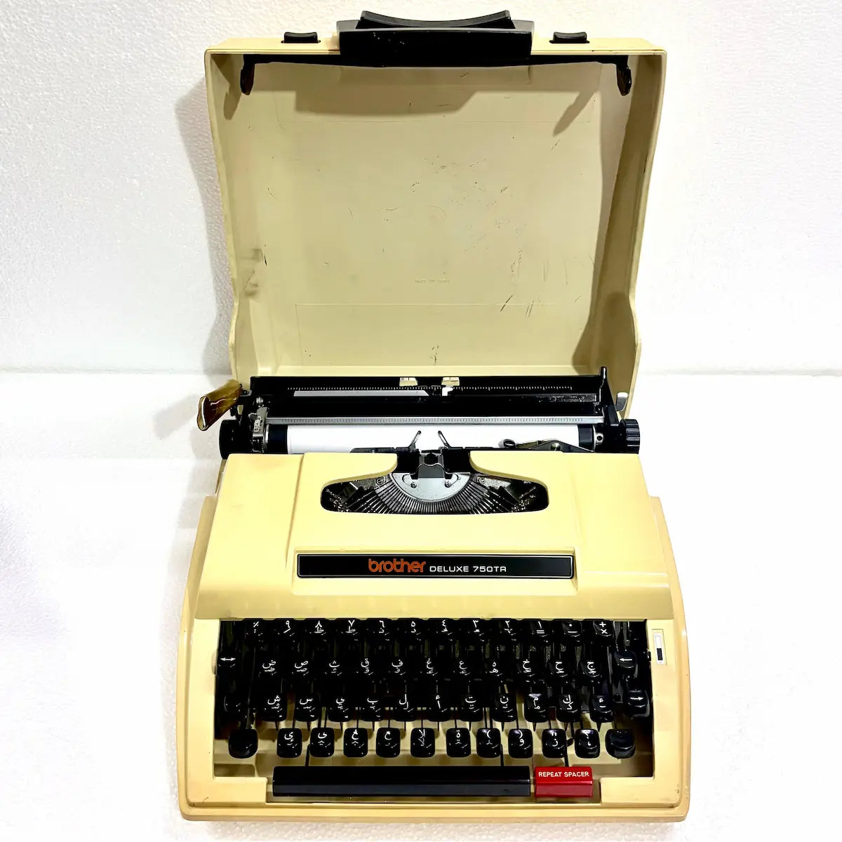 Brother Deluxe 750TR Arabic typewriter with cream body, black Arabic keyboard and hard case, restored by RR Typewriter Mart in India