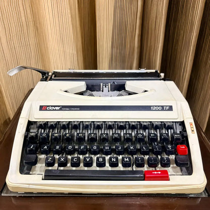 Clover 1200 TF vintage typewriter with cream body, compact manual English typewriter for writers and collectors