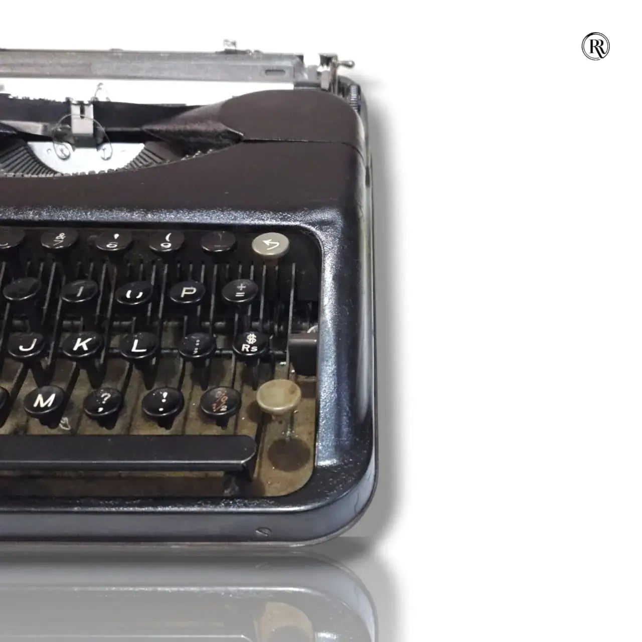 Close-up of black Hermes Baby typewriter keyboard, vintage manual English typing machine from RR Typewriter Mart