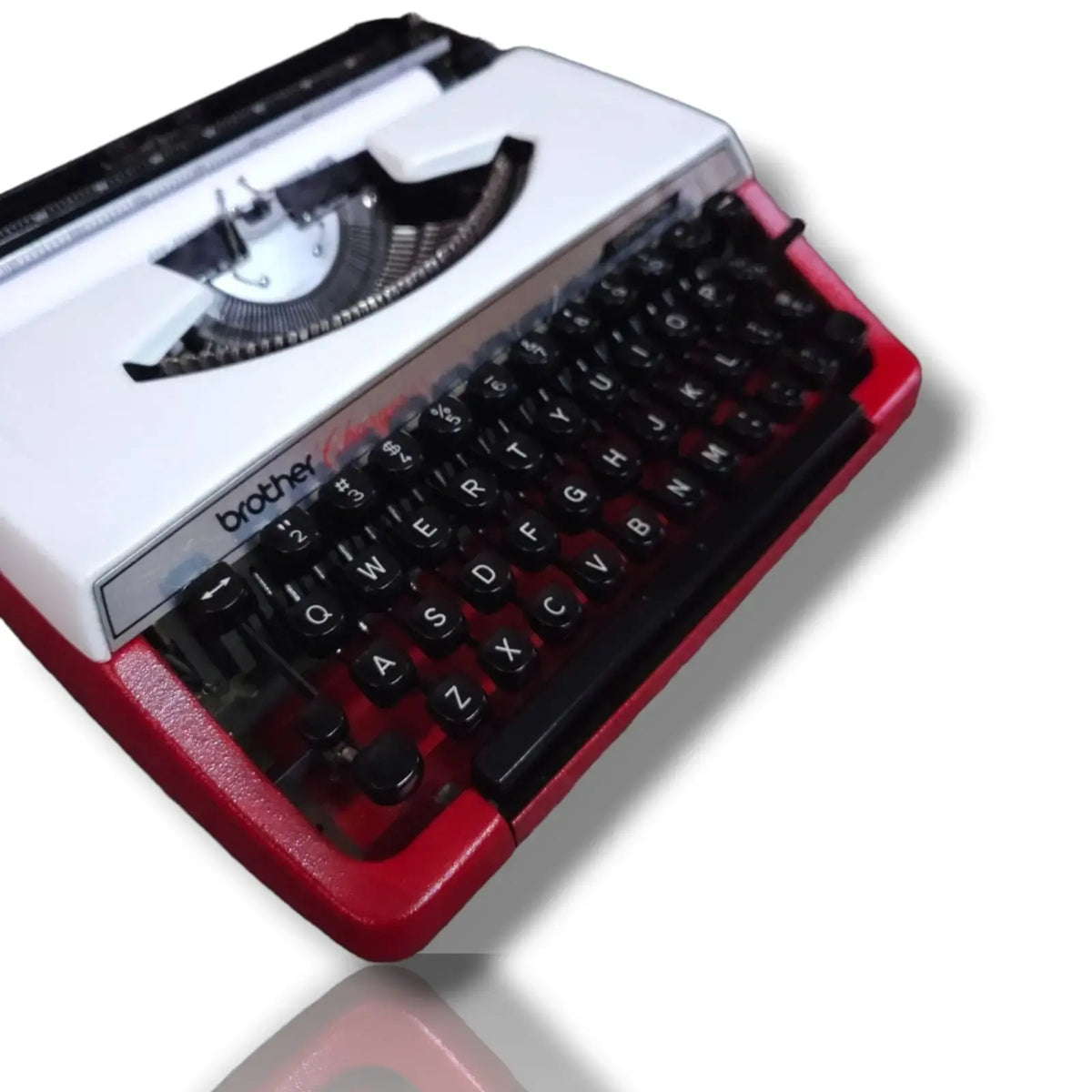 Brother Charger 11 vintage portable typewriter with QWERTY keyboard and metal body