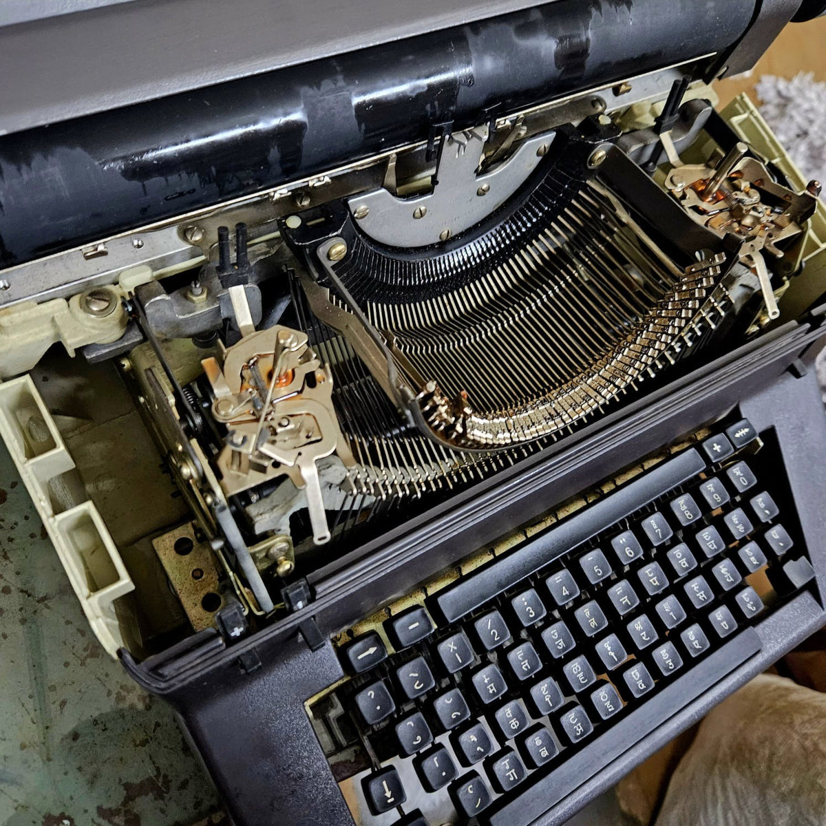 Angled view of Facit 1740 Devanagari manual typewriter displaying original typebasket and keyboard assembly