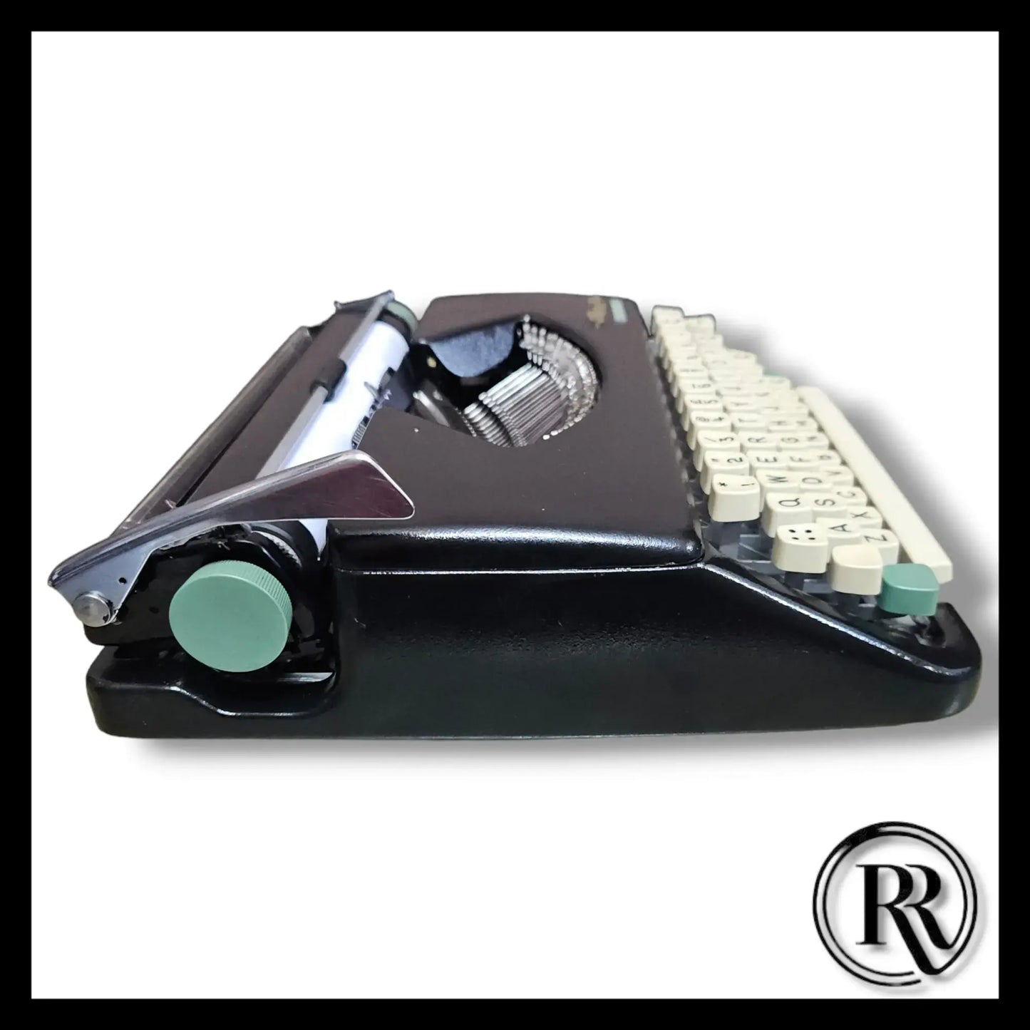 Side profile Olympia Typewriter portable body design, Manual English Typewriter by RR Typewriter Mart
