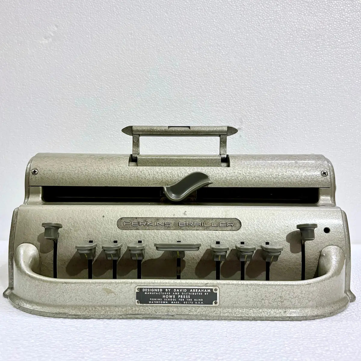 Perkins Typewriter in distinctive gold finish, an original complete American import for Braille writing and learning from RR Typewriter Mart