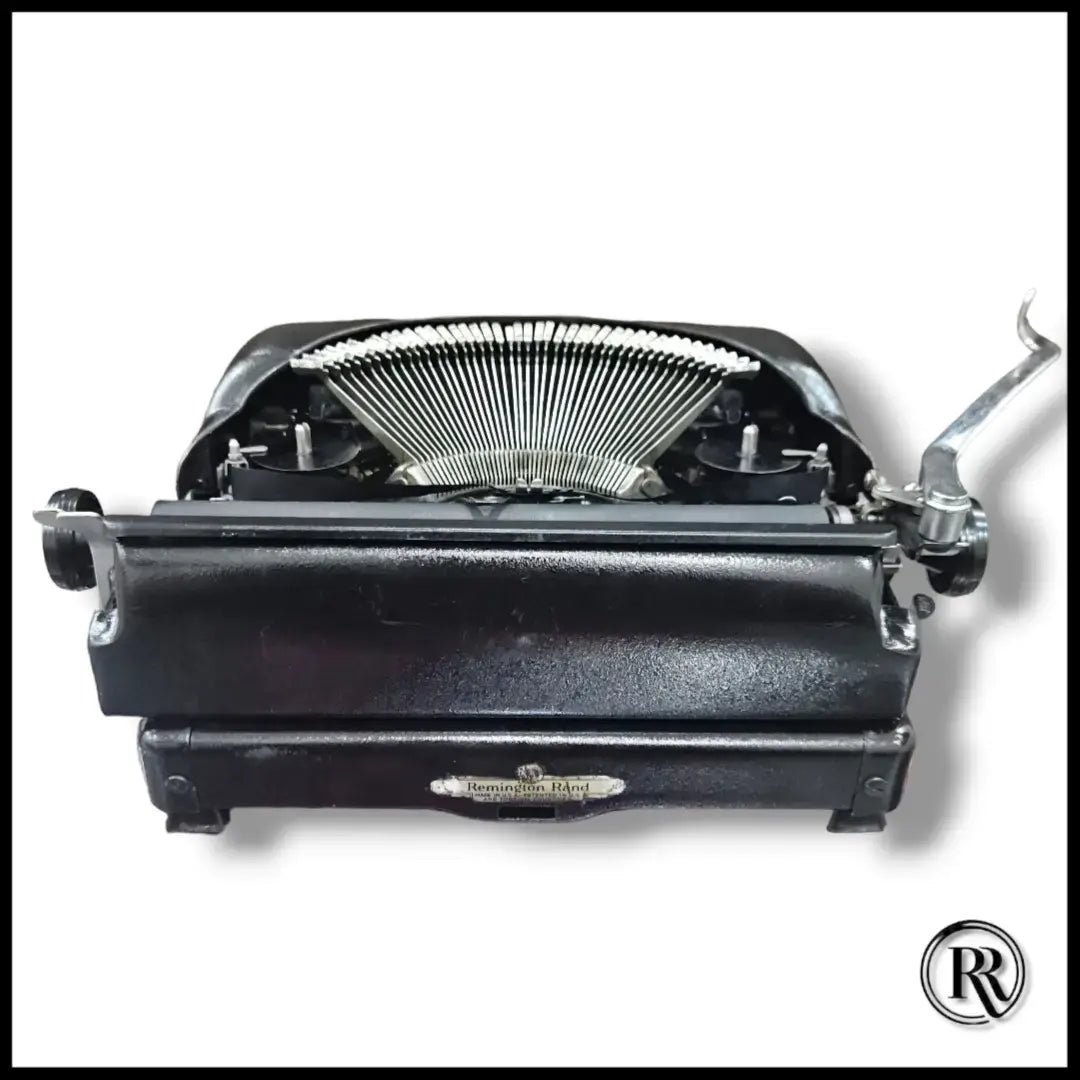 Rear view of black Remington typing machine, vintage Manual English Typewriter at RR Typewriter Mart
