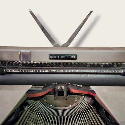 Royal Quiet De Luxe badge and carriage close-up on Manual English Typewriter by RR Typewriter Mart, Royal Typewriter