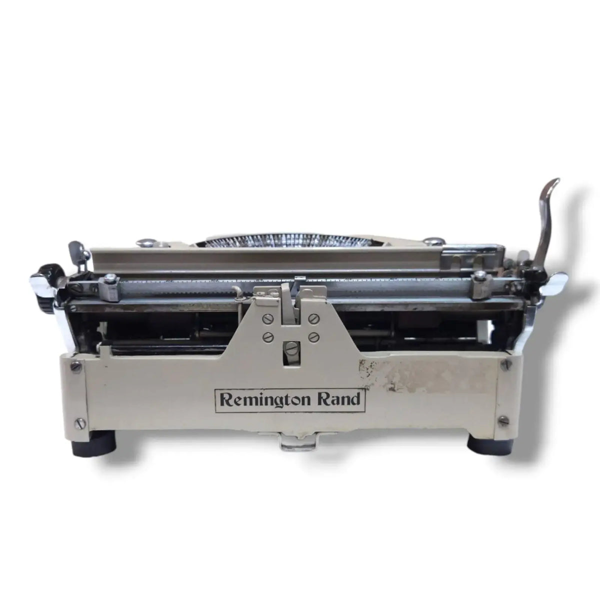 Rear view of Remington Rand Noiseless manual typewriter showing carriage, metal frame and classic typing machine construction