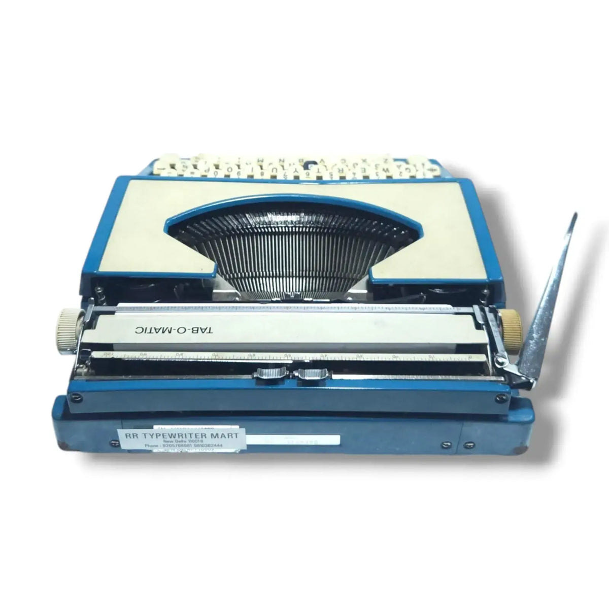 Rear view Imperial Tab-O-Matic imported typewriter with metal body and English typing keyboard